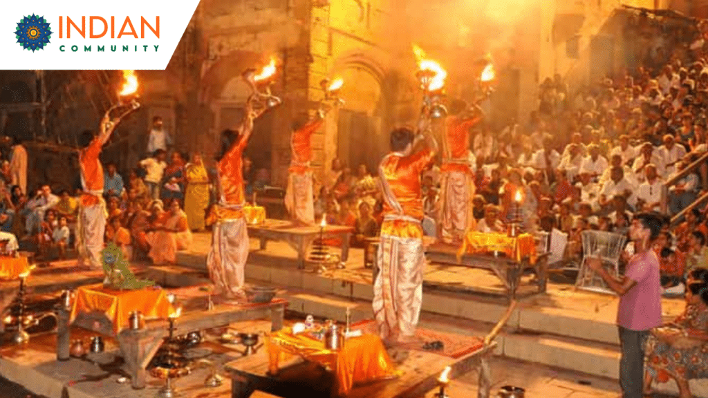 People praying with lamps in hands.