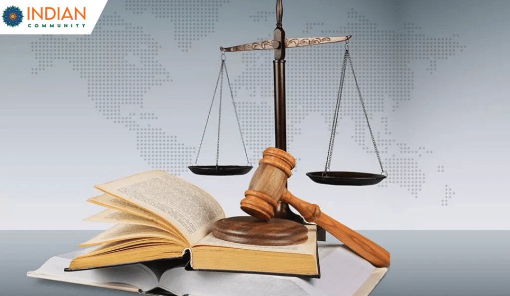 a scale of justice, a gavel, and open books, symbolizing law and education