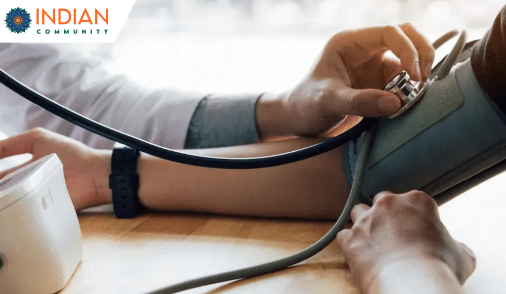 A healthcare professional measuring a patient's blood pressure using a sphygmomanometer, symbolizing the importance of monitoring blood pressure for health management.