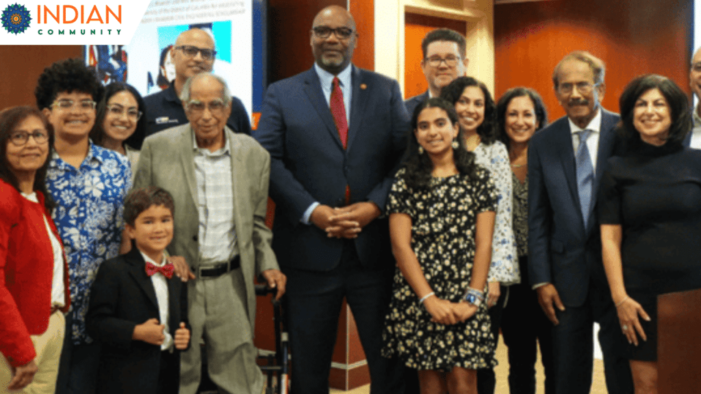 Inder Bhambri, alongside members of the Indian diaspora