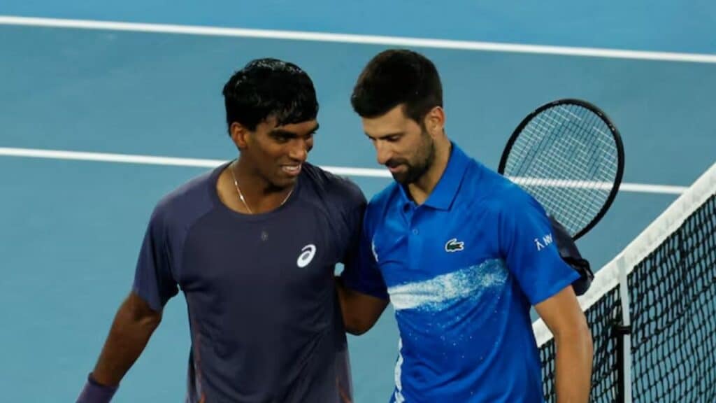 Nishesh Basavareddy with Novak Djokovic.