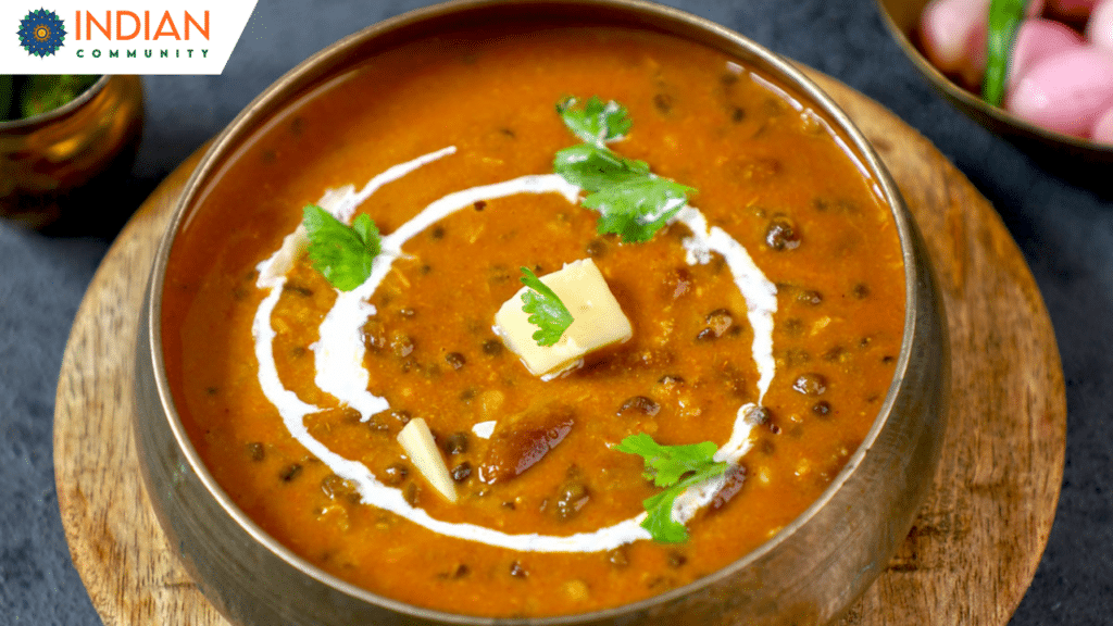 Delicious Dal Makhani served with a creamy texture, garnished with fresh cilantro and a swirl of cream, ready to enjoy.