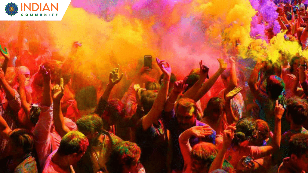 Group of people celebrating Holi festival with vibrant colors in Atlanta, Georgia.