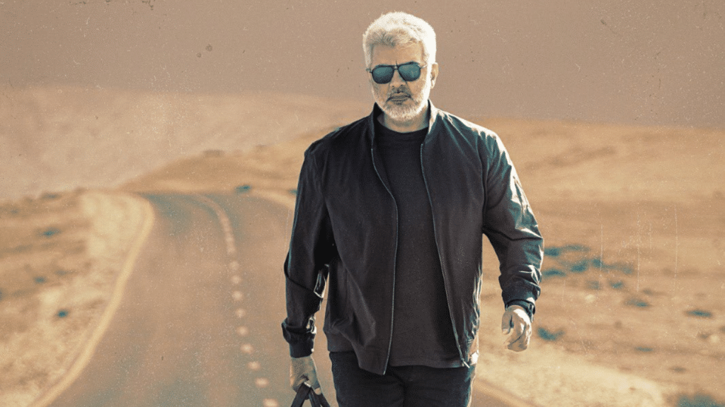 Ajith Kumar in a still from 'Vidaamuyarchi', showcasing his intense look as he prepares for a high-octane action sequence.