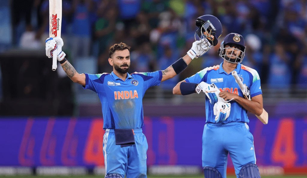 Indian batsman Virat Kohli celebrates his century and India’s win over Pakistan with Axar Patel in the Champions Trophy match at Dubai International Stadium on Sunday.