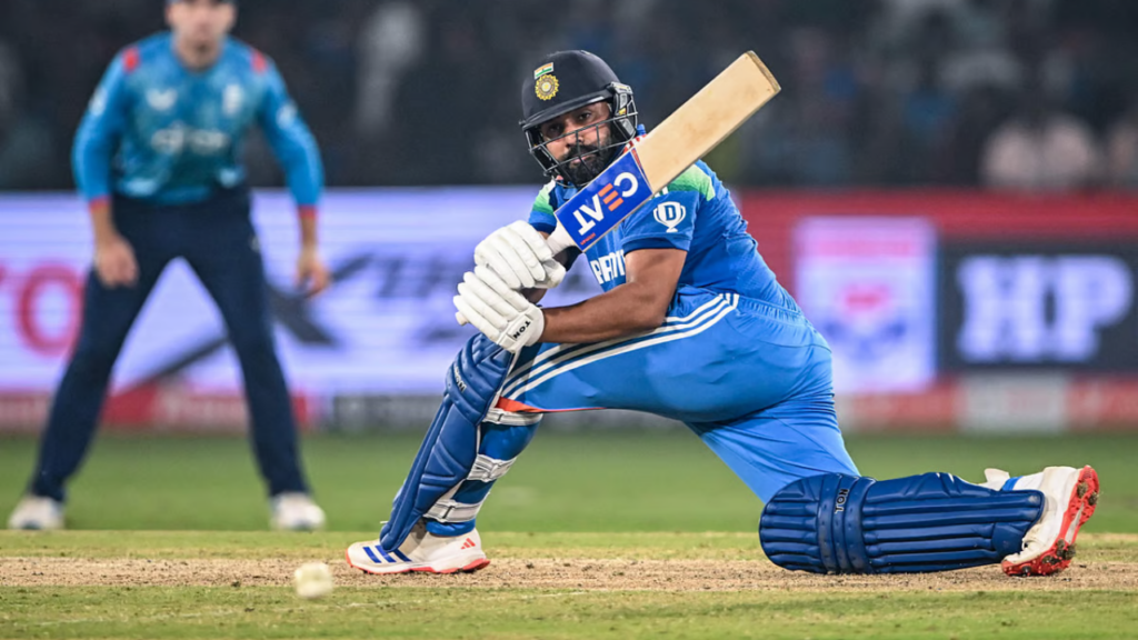 India's captain Rohit Sharma sweeps a shot