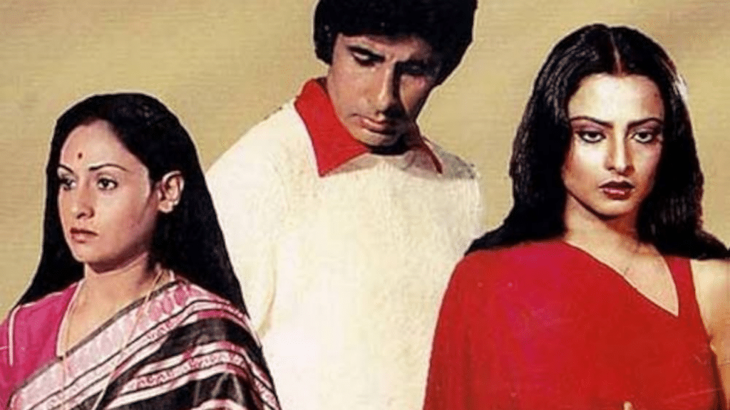 Amitabh Bachchan, Rekha, and Jaya Bachchan in an iconic scene from Silsila (1981).