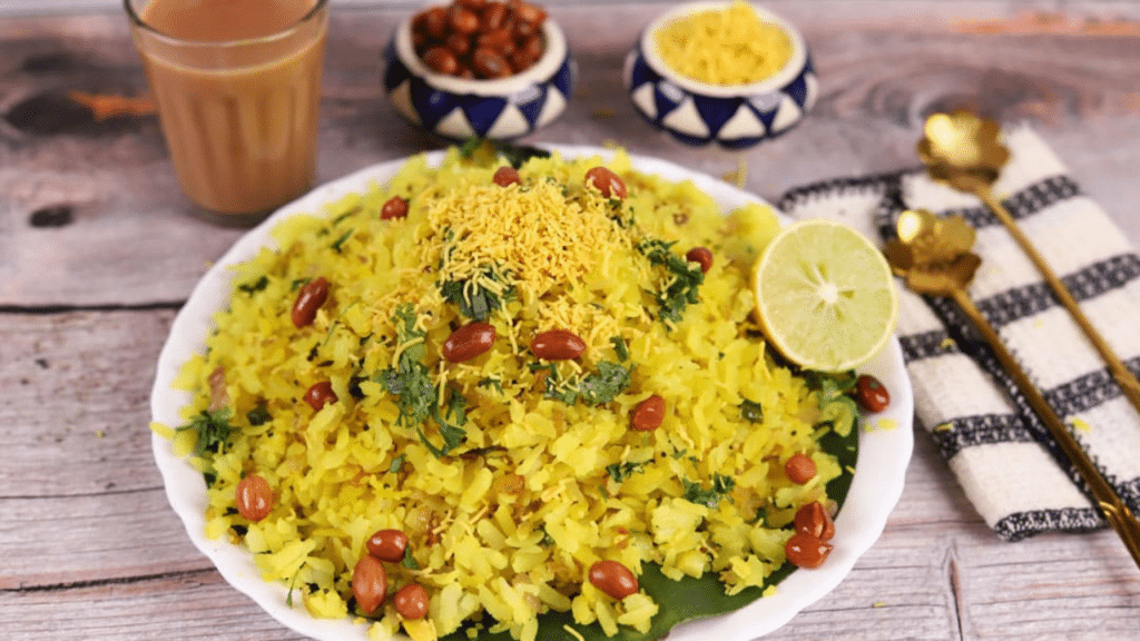 Poha, a popular Indian breakfast dish, is made from flattened rice and is known for its light yet satisfying texture.