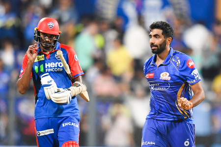 IPL 25: Santner, Bumrah, Surya star as MI storm into playoffs with a 59-run win over DC (Ld)