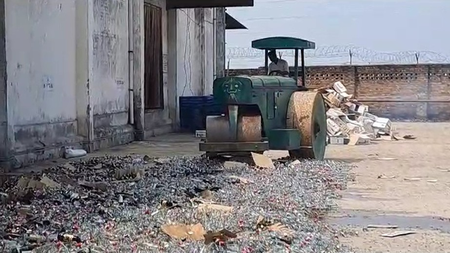 Gujarat: Liquor valued at Rs 59 lakh crushed in Vadodara after court order