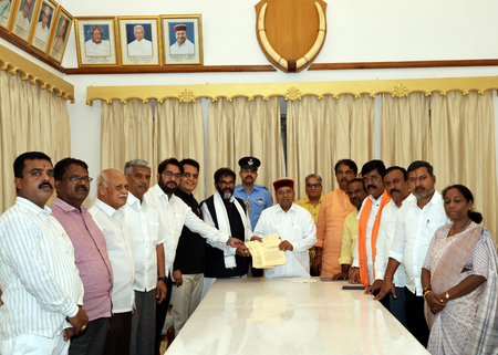 K’taka BJP delegation meets Guv, demands dismissal of Priyank Kharge