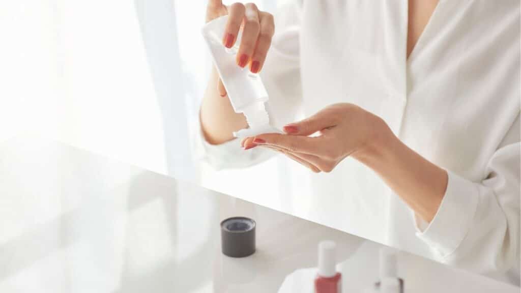 flat brush dipped in makeup remover