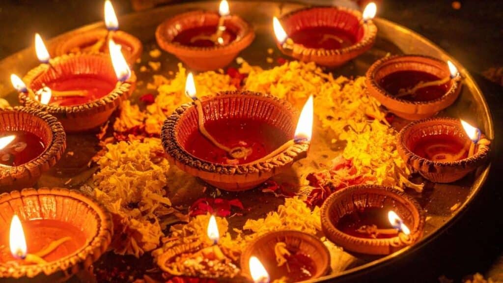 Diwali: Date, Puja Muhurat, Lakshmi Puja Significance, Mantra, Aarti, Rangoli Designs, and Complete Celebration Guide 4 diyas diwali