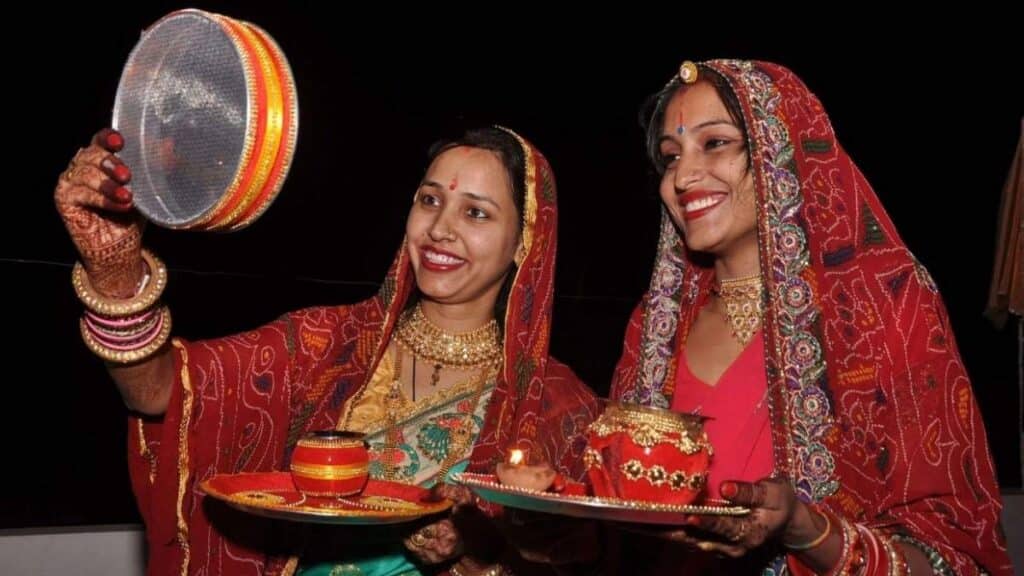 Karwa Chauth : Date, Puja Muhurat, Vrat Katha, Aarti, Mehendi Designs & Complete Puja Rituals 9 married women celebrating karwa chauth