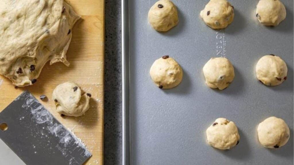 dough cutting hot cross bun