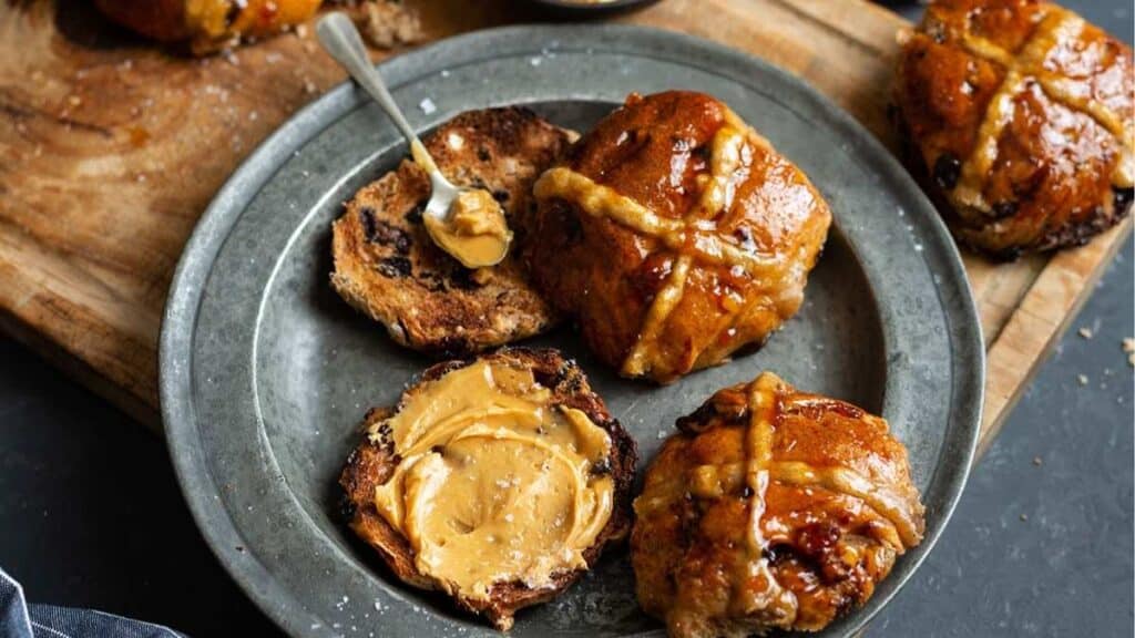 orange icing on hot cross bun